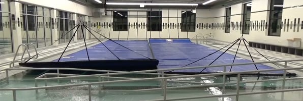 Automatic swimming pool cover