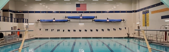 Wall mounted Alta thermal pool covers on automatic reels.